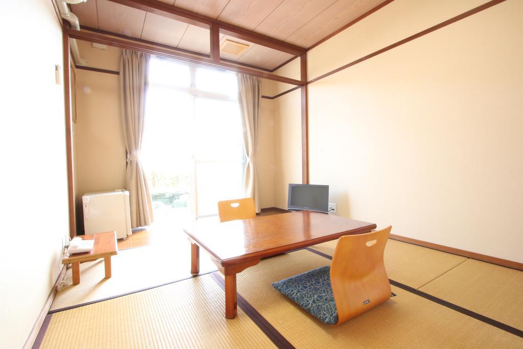 Готель Shinwakan Satsumasendai Номер фото